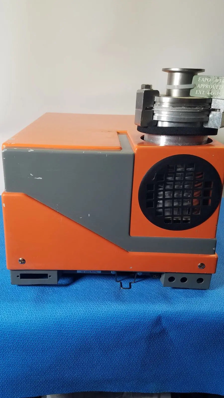 Orange and gray Alcatel Drytel 31 vacuum pump station with metallic top assembly for industrial vacuum pump use