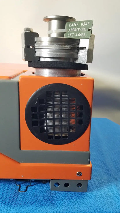 Alcatel drytel 31 vacuum pump station with orange and gray industrial vacuum pump and metallic top assembly