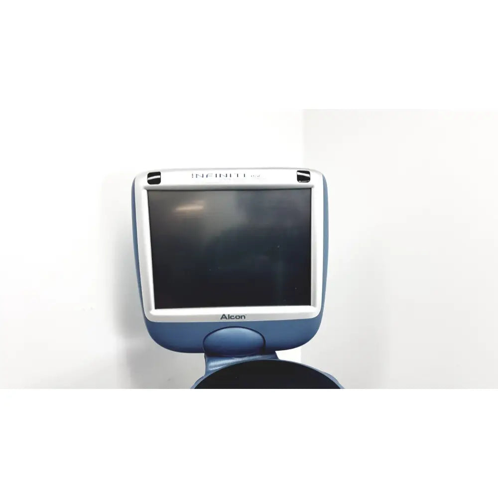 Blue and white Alcon Infiniti Vision 102 phacoemulsification surgical microscope for ophthalmic procedures