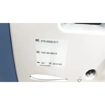 White rectangular label with black printed reference and serial number on the back of alcon infiniti vision phacoemulsification unit