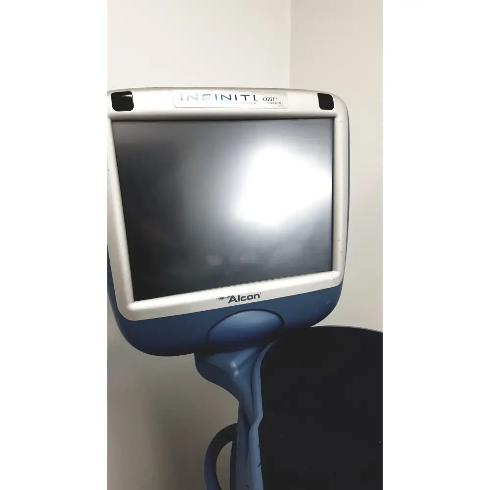 Blue and silver alcon infiniti vision system model 210-0000-511 ozt contact lens examination device with curved screen frame