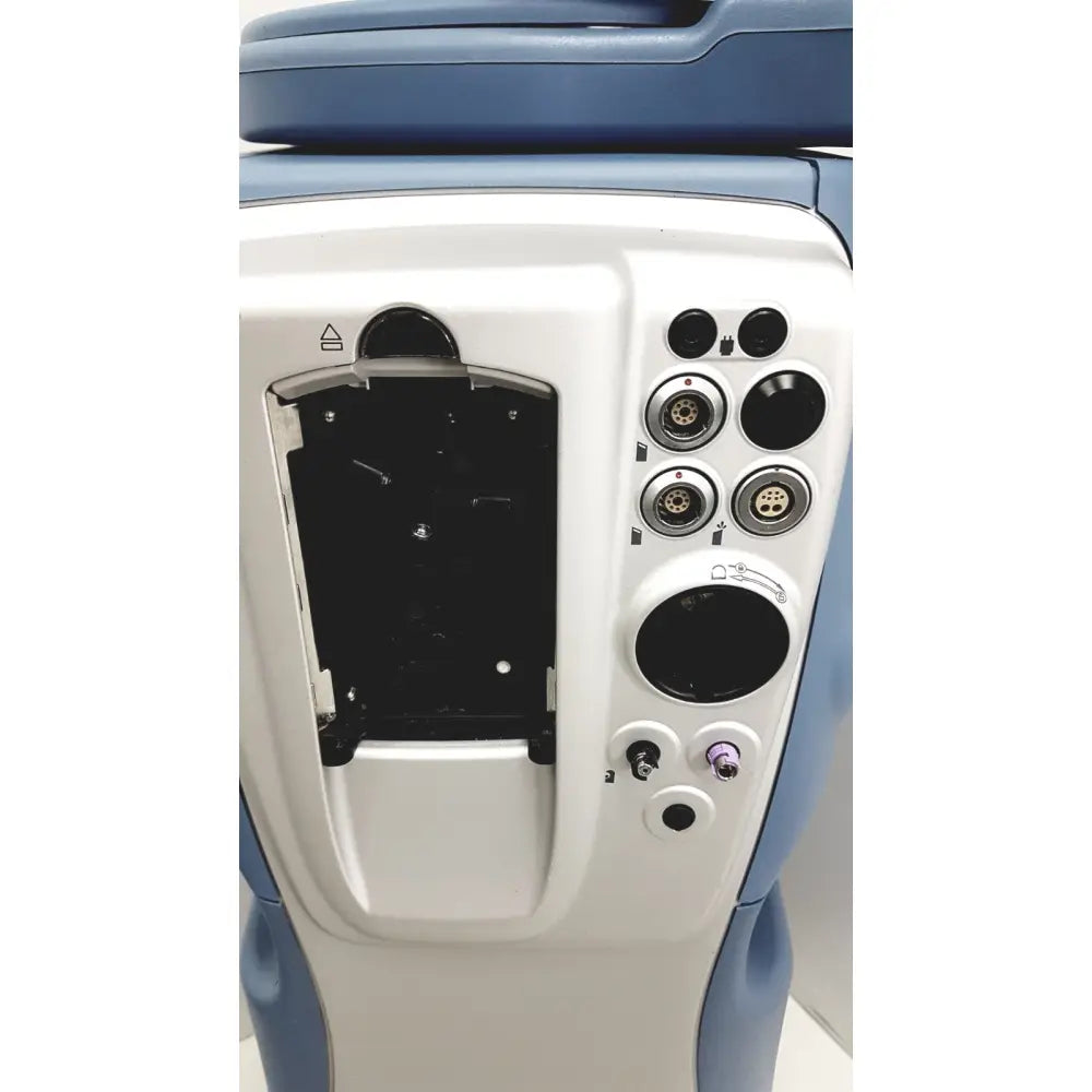 Blue and white medical device with multiple circular ports and purple connector on the back of alcon infiniti vision system model 210-0000-511