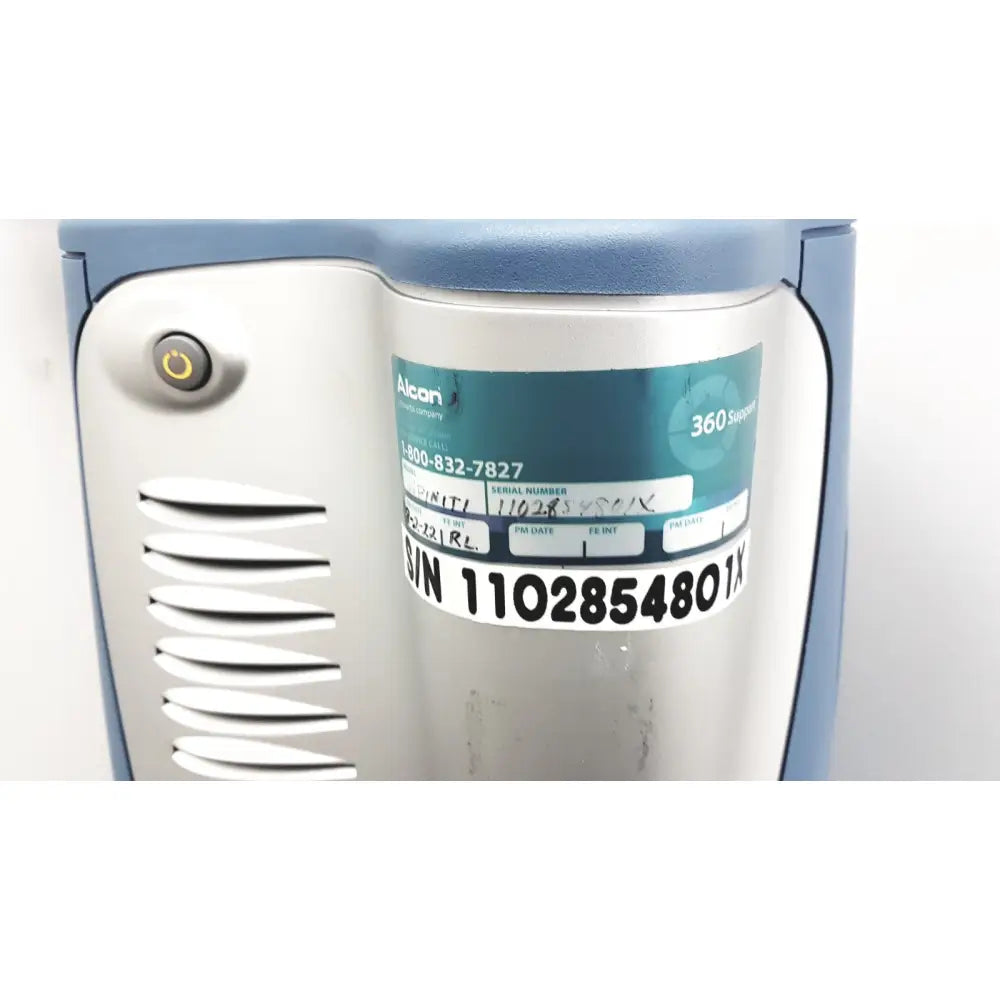 Alcon infiniti vision system model 210-0000-511 sleek light blue and silver reuse medical device with circular power button
