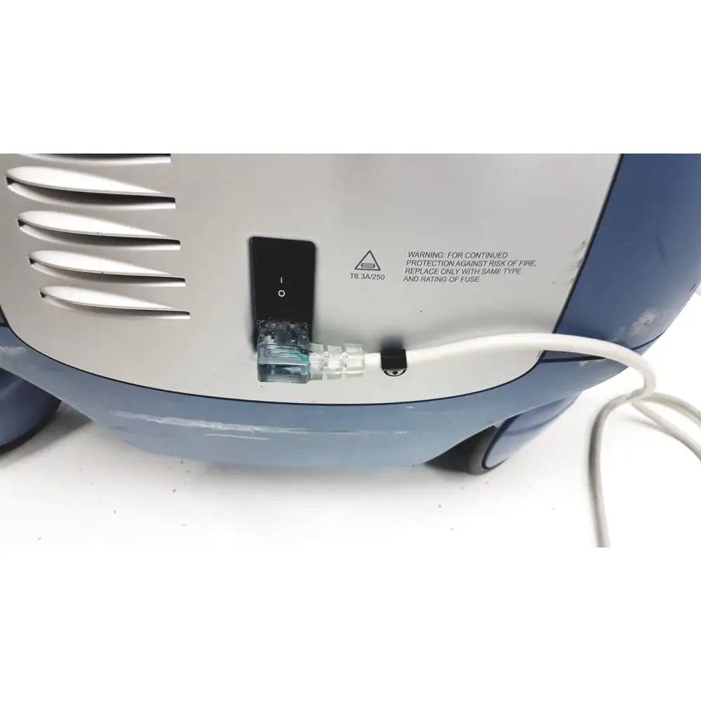 Blue and silver electric air compressor with black power switch and white cord for alcon infiniti vision system model 210-0000-511