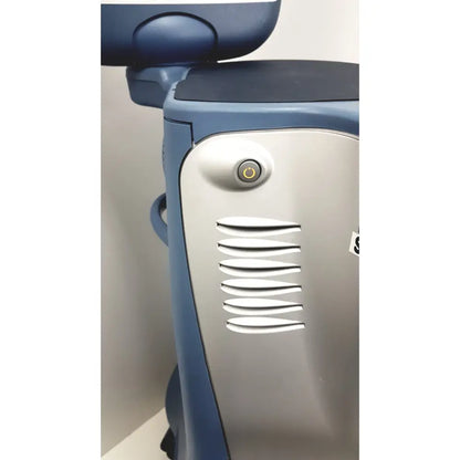 Blue and silver alcon infiniti vision system model 210-0000-511 medical imaging machine showing power button and vents
