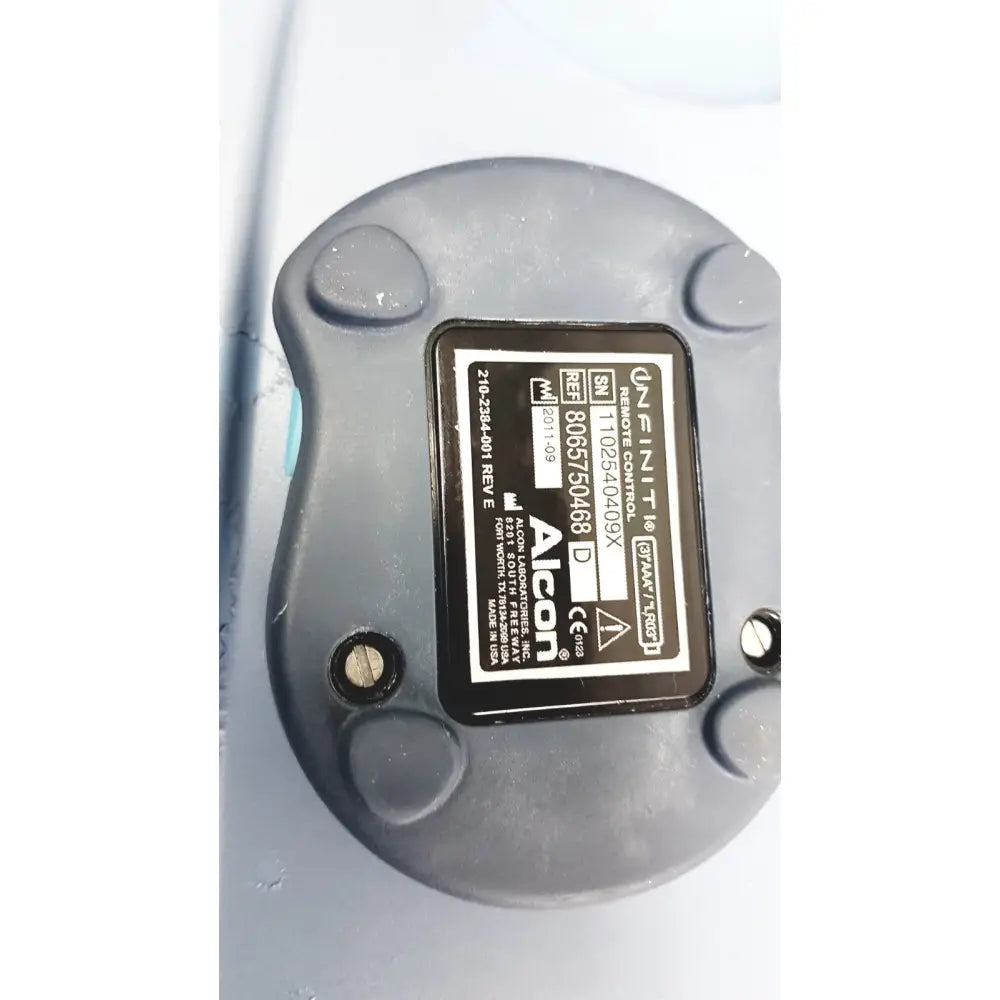 Black plastic remote control with aicon label for alcon infiniti vision system model 210-0000-511 reuse medical device