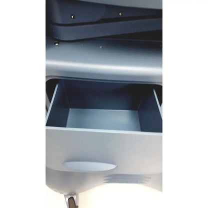 Gray plastic drawer with smooth rounded handle and visible screws on top surface of alcon infiniti vision system model 210-0000-511