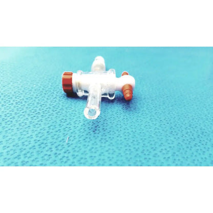 Clear plastic aldrich glass 14/20 septum inlet flow control adapter with red caps and white ptfe bore body