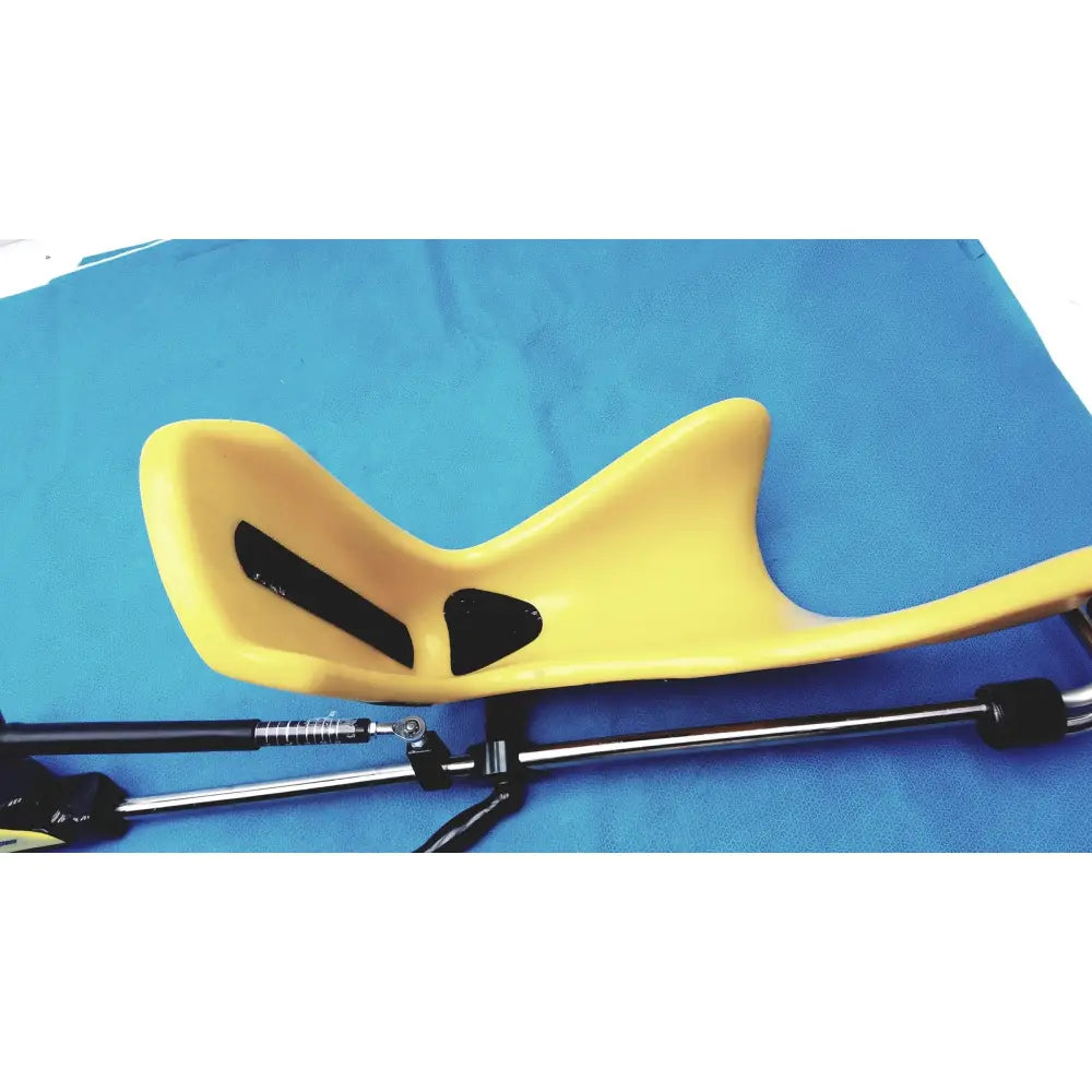Yellow plastic pelvic tilt exercise device with black rubber inserts and metal frame for allen medical yellofins elite lift-assist stirrups