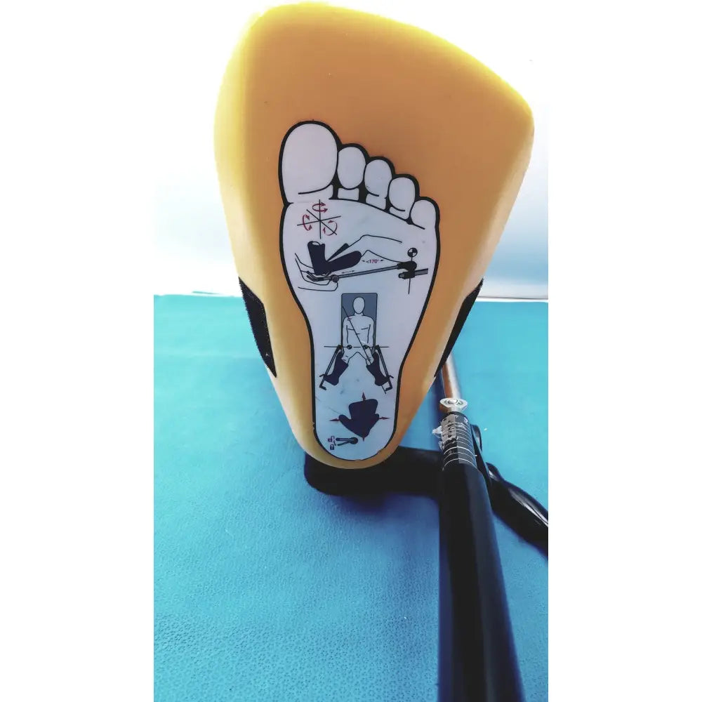 Yellow foot-shaped massage device with black accents and white reflexology diagram for allen medical yellofins elite stirrups