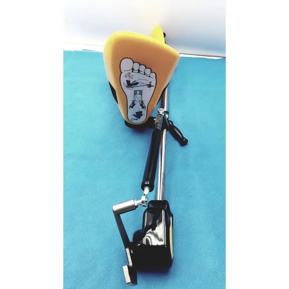 Yellow foot-shaped allen medical yellofins elite lift-assist stirrups with black accents and foot diagram on surface