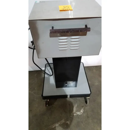 Allied healthcare gomco 3040 aspirator stainless steel food warmer with black base handle and ventilation slits for reuse medical use
