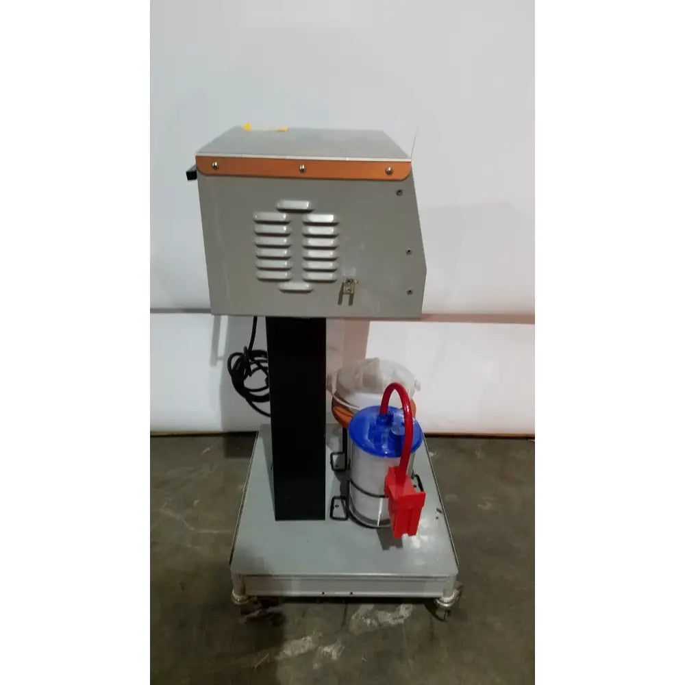 Industrial-grade allied healthcare gomco model 6037 aspirator with metallic gray housing, orange trim, and red suction handle
