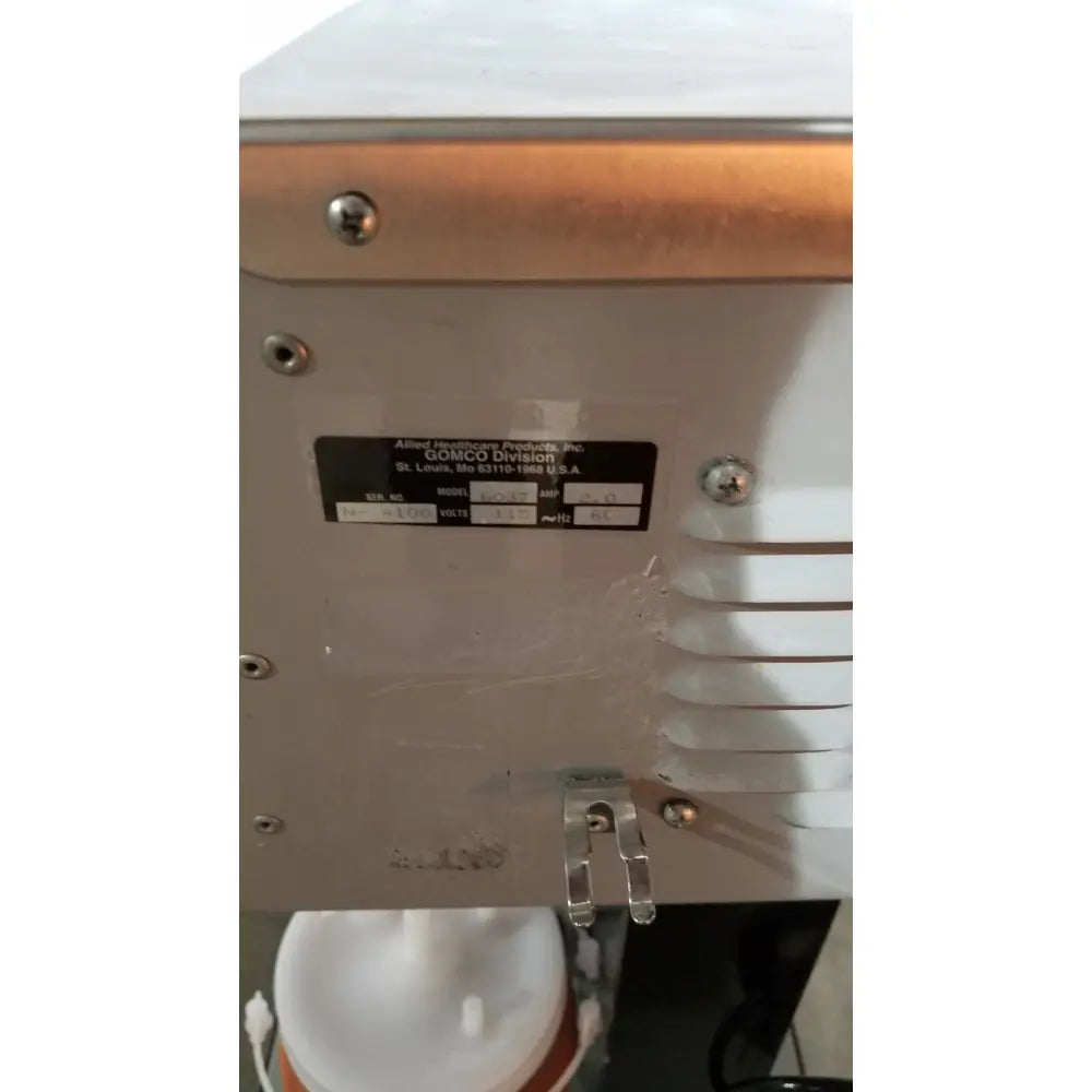 Silver metallic allied healthcare gomco model 6037 aspirator from comico division for medical suction use