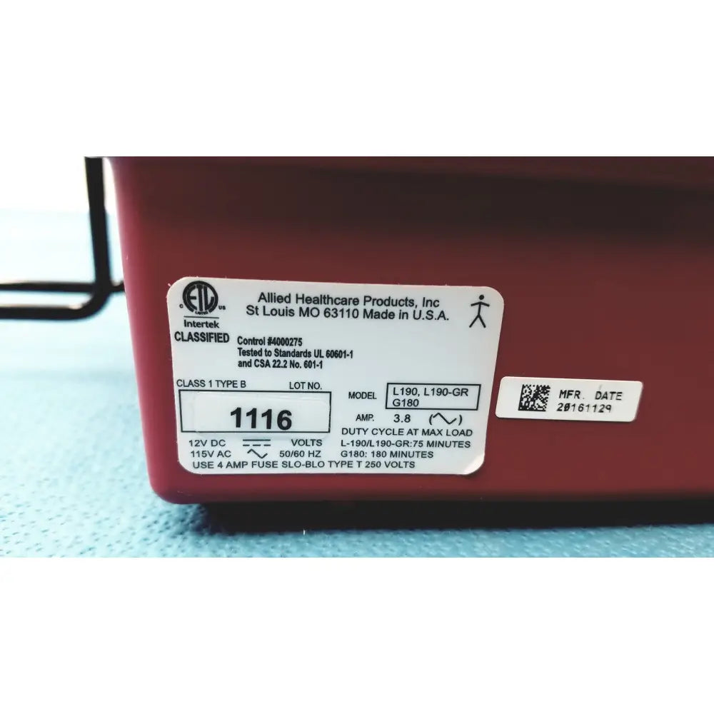 Red rectangular allied healthcare gomco optivac g180 portable aspirator showing 12v dc power specifications