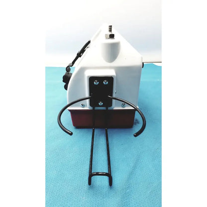 White and maroon bicycle rack with black metal hooks for allied healthcare gomco optivac g180 portable aspirator