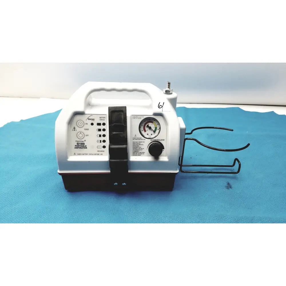 White and black allied healthcare gomco optivac g180 portable aspirator with pressure gauge control buttons and handle