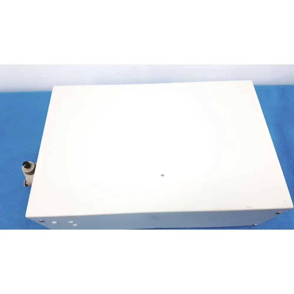 White rectangular Alltech 301 pump hplc laboratory unit with small black cylindrical component for chromatography use