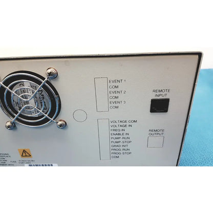 White alltech 301 pump hplc laboratory control panel with black labeled ports and circular fan on the left side back view