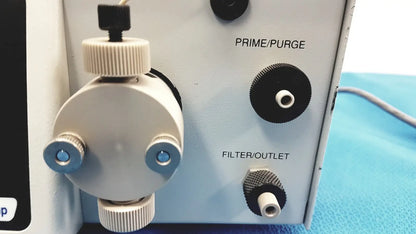 Gray plastic Alltech 301 pump HPLC laboratory unit with black knobs and blue-tinted prime purge fittings