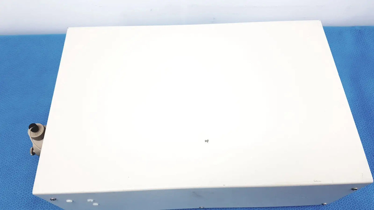 White rectangular Alltech 301 pump hplc laboratory unit with small black cylindrical component for chromatography use