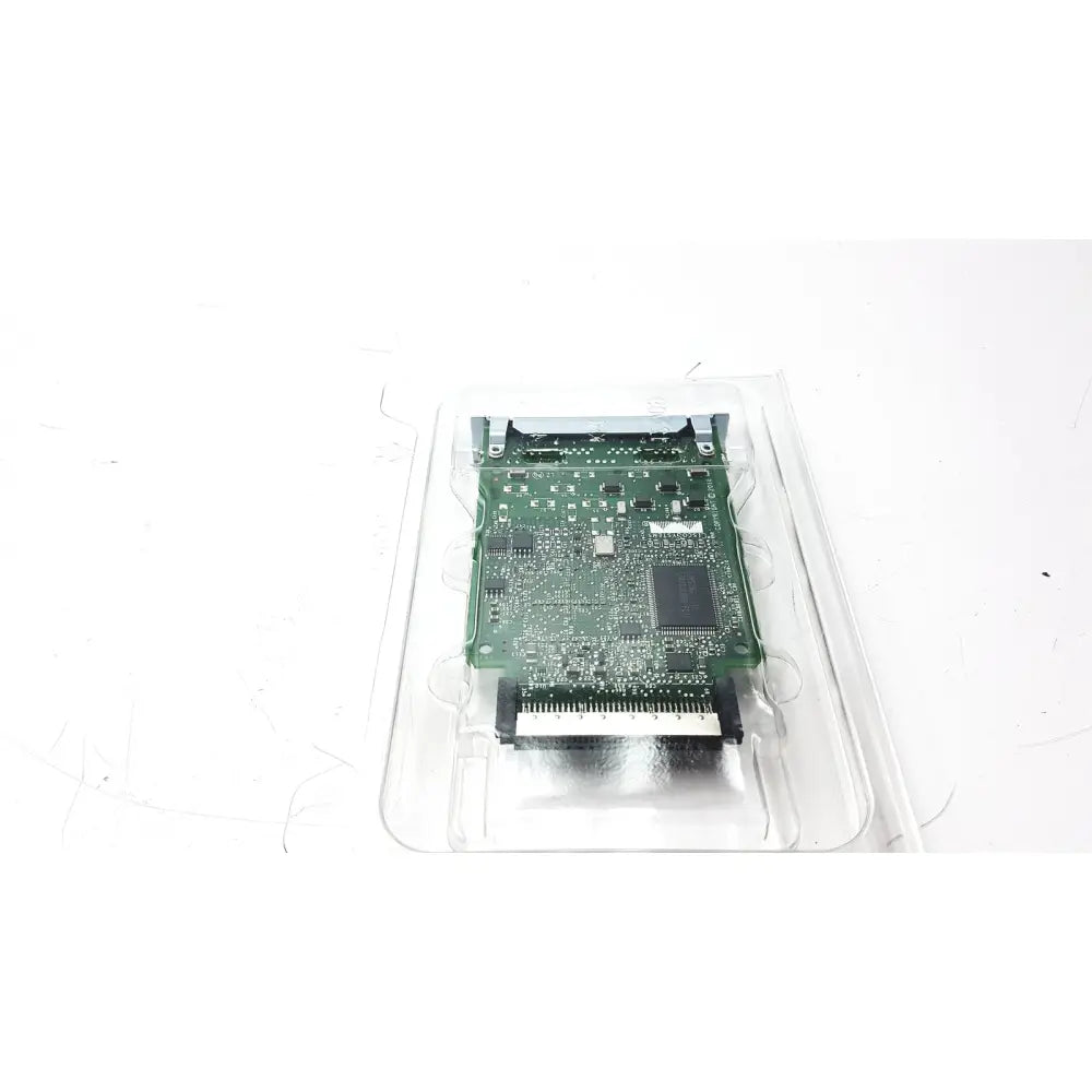 Green circuit board with black integrated circuits and silver connectors in clear packaging for altera stratix ii cisco vwic3 module