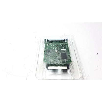 Green circuit board with black integrated circuits and silver connectors in clear packaging for altera stratix ii cisco vwic3 module