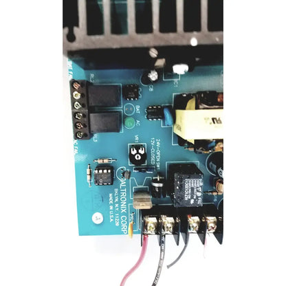 Blue altronix al400ulx power supply pcb with black components and labeled connectors for 12vdc or 24vdc output