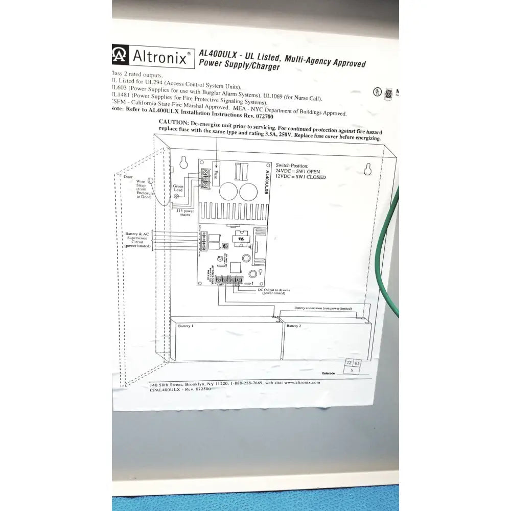 Altronix al400ulx power supply charger with schematic diagram and labeled components in black metal housing