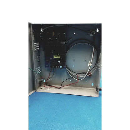 Black altronix al400ulx power supply control panel with green display and multiple ports in metallic enclosure