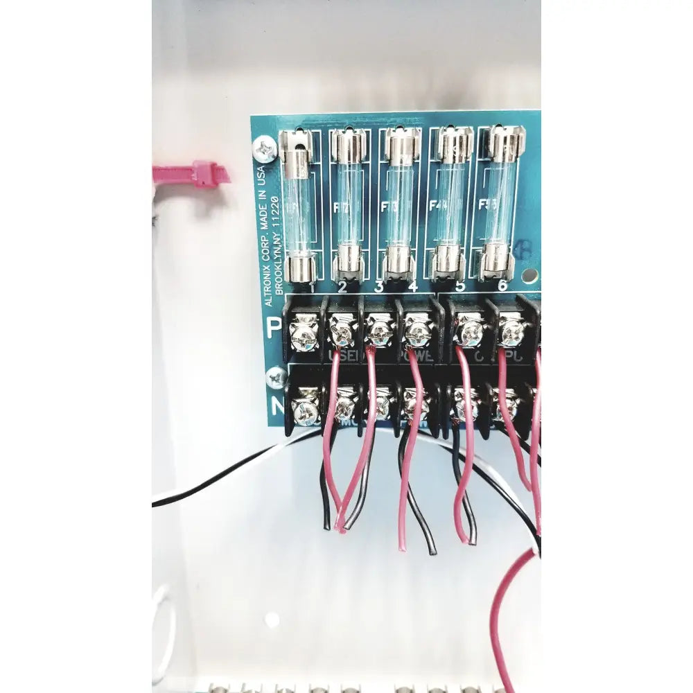 Blue altronix smp5ctx high current power supply charger 12vdc 24vdc showing front panel details