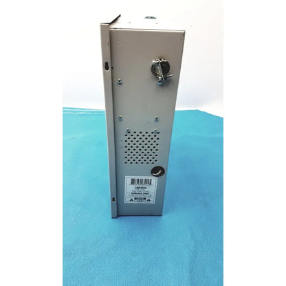 Gray metal altronix smp5ctx high current power supply with perforated panel and key-operated lock on the side