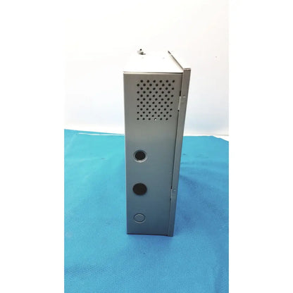Gray metal industrial enclosure with perforated panel and circular cutouts for altronix smp5ctx power supply
