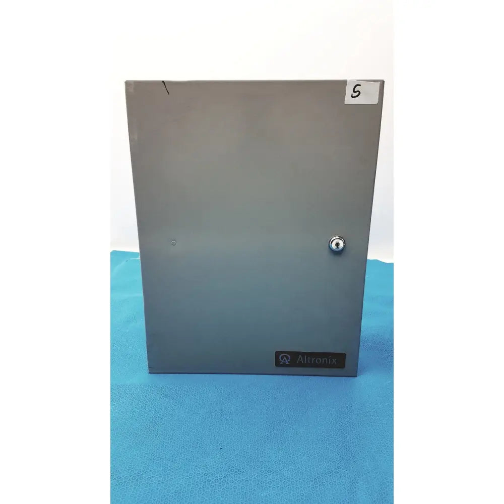 Gray metal altronix smp5ctx power supply enclosure with keyhole and label for 12vdc or 24vdc power management
