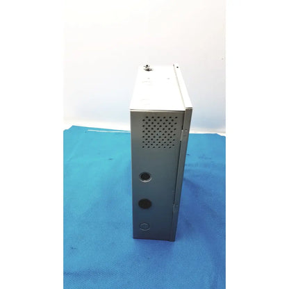 Gray metal server rack with perforated ventilation panel and mounting holes on the back of altronix smp5ctx power supply