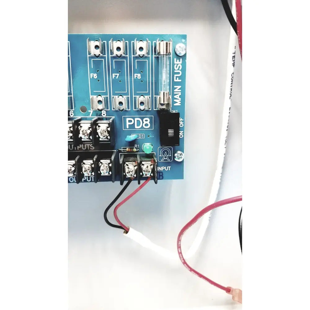 Blue pd8 power distribution board with silver terminal blocks and labeled fuse slots on altronix smp5ctx power supply