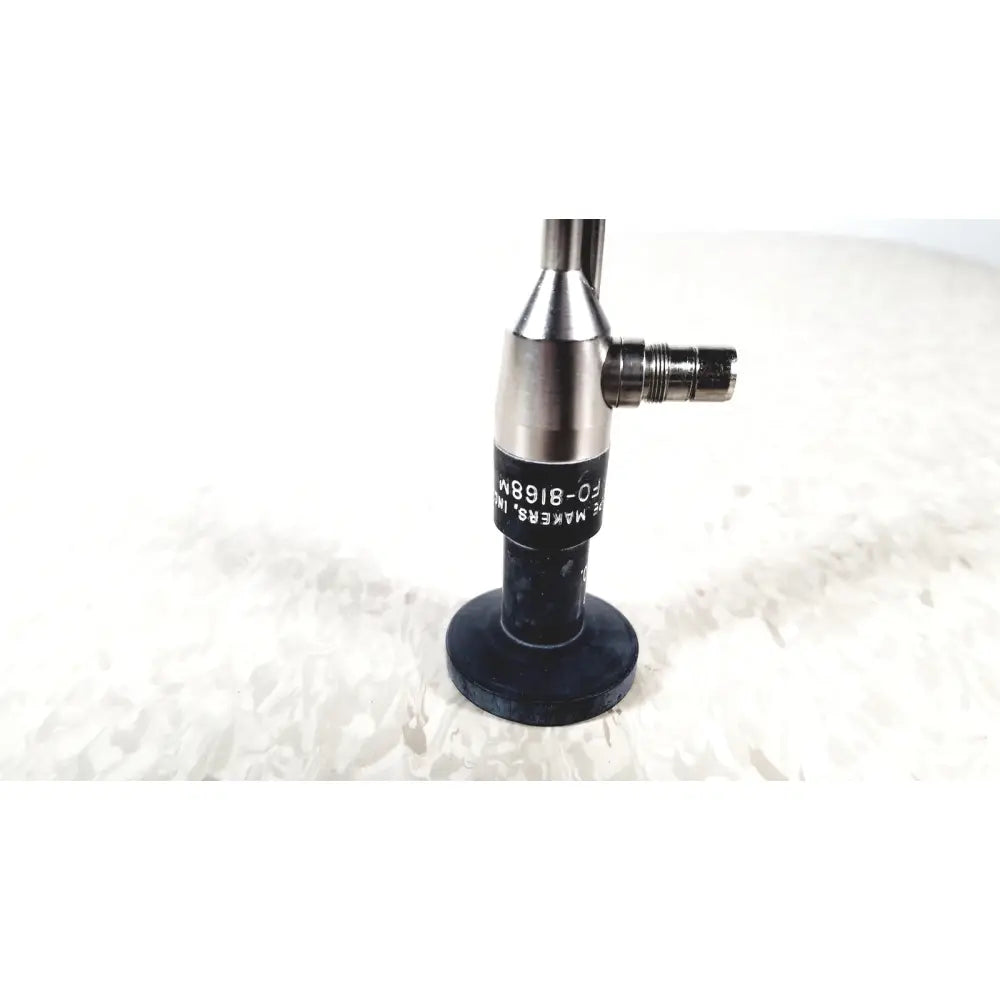 Black and silver medical endoscope with cylindrical body and threaded connector by American Cystoscope Makers FO-8168M microlens