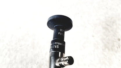 Black cylindrical cystoscope lens with matte finish and engraved markings by american cystoscope makers fo-8168m microlens