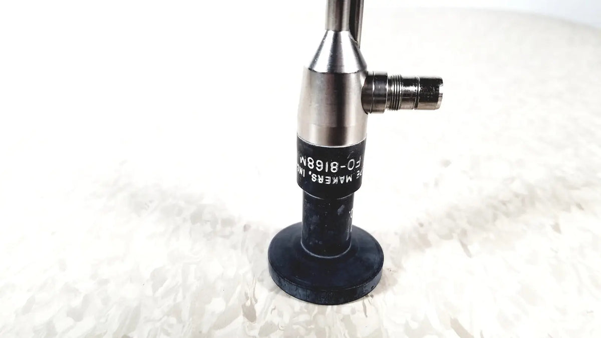Black and silver medical endoscope with cylindrical body and threaded connector by American Cystoscope Makers FO-8168M microlens
