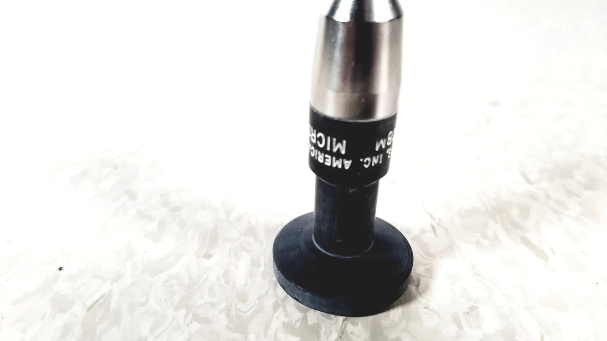 Black and silver microscope objective lens with black rubberized base from american cystoscope makers fo-8168m microlens
