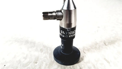 Silver and black microscope objective lens with engraved text from american cystoscope makers fo-8168m microlens barrel