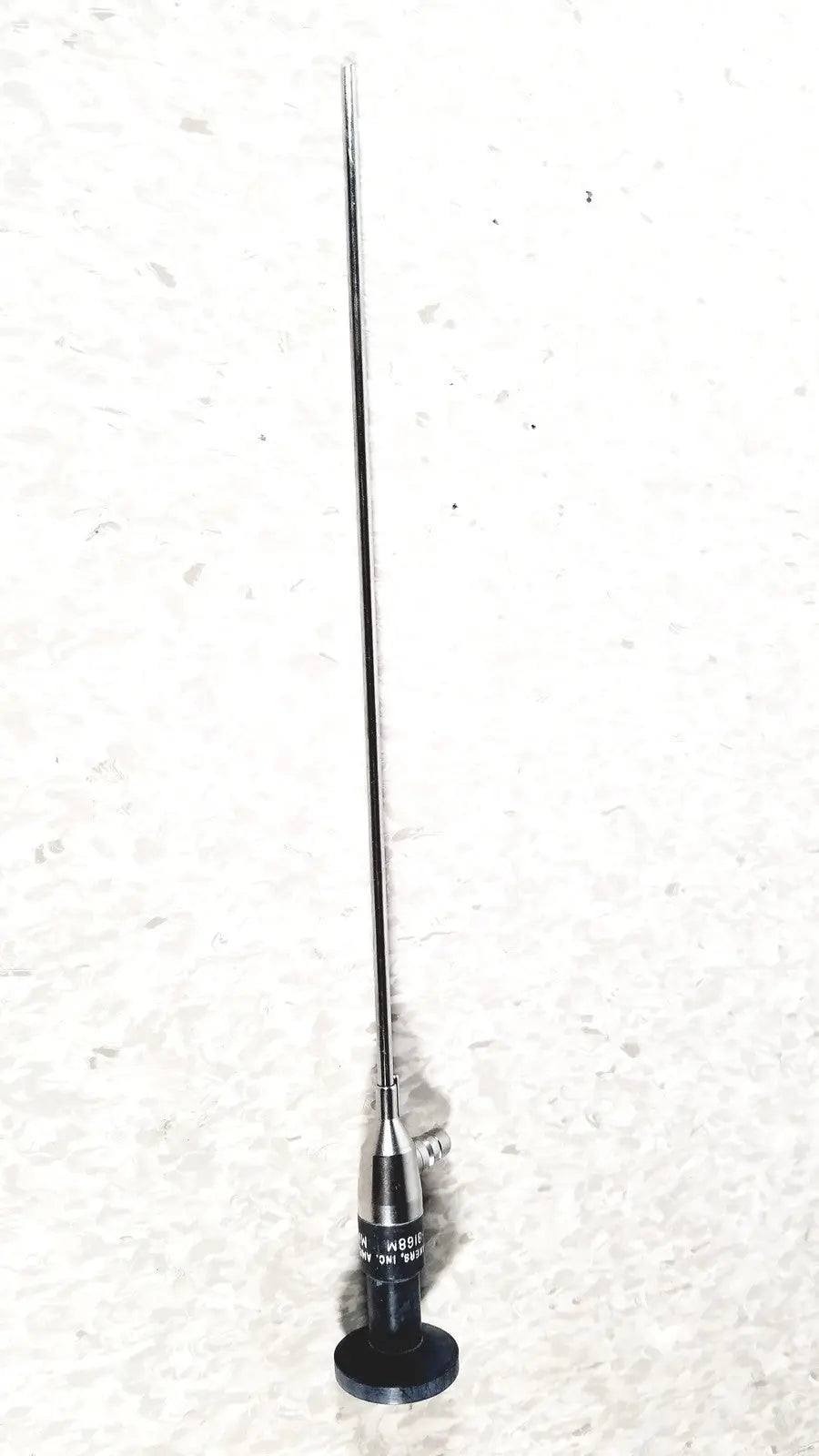 A slender metallic cystoscope with a long thin shaft and black base from american cystoscope makers FO-8168M microlens