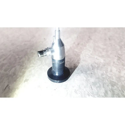 Silver and black medical endoscope with threaded connector and circular base by american cystoscope makers