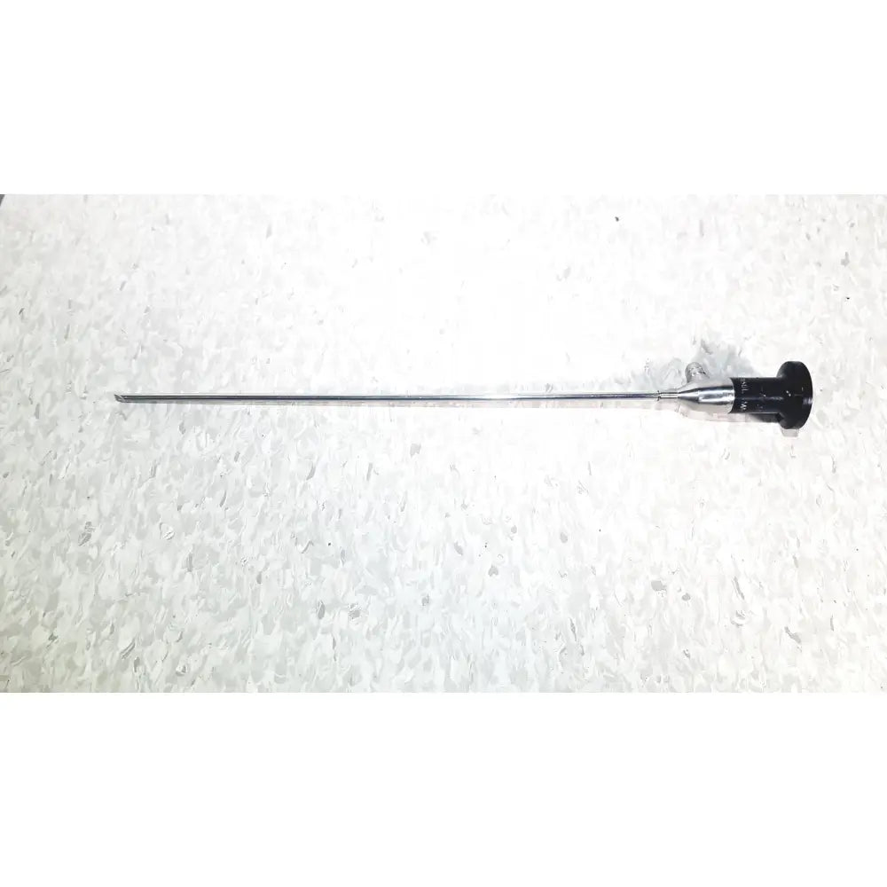 A sleek metallic cystoscope with black ergonomic handle and polished stainless steel shaft by american cystoscope makers