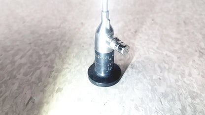 Silver and black medical endoscope with cylindrical body and threaded connector by american cystoscope makers