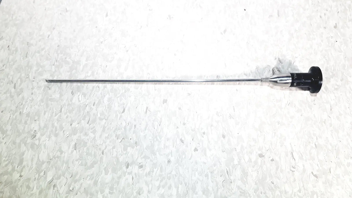 A sleek metallic cystoscope with black ergonomic handle and polished stainless steel shaft by american cystoscope makers