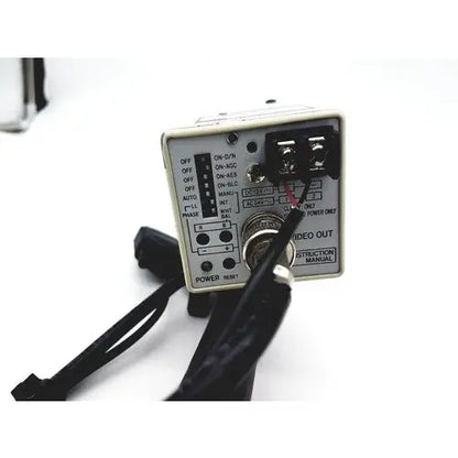 White rectangular back side of american dynamics adcshr2412n super high resolution fixed camera with black labeled switches and rotary dial