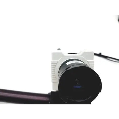 White compact american dynamics adcshr2412n super high resolution fixed camera with black lens and textured body