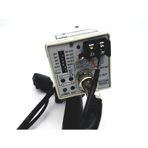 Black and silver industrial control panel with labeled switches and rotary knob for american dynamics adcshr2412n camera