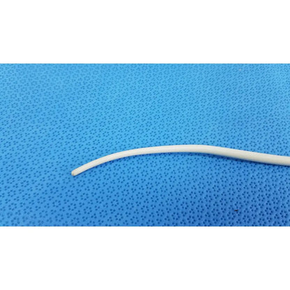 A smooth off-white american endoscopy 15fr maloney tapered tungsten-filled esophageal bougie on blue surface